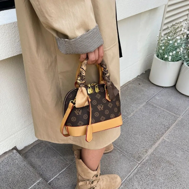 New temperament women's bag, fashionable vintage letter shell bag, hand-held single shoulder diagonal cross bag