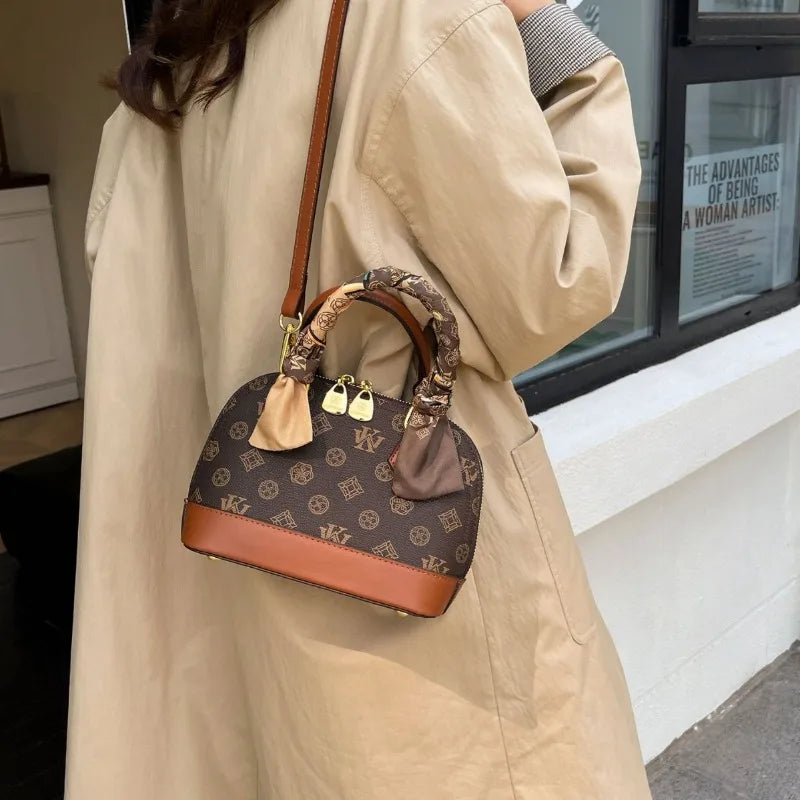 New temperament women's bag, fashionable vintage letter shell bag, hand-held single shoulder diagonal cross bag