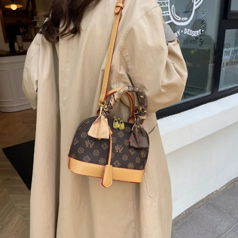 New temperament women's bag, fashionable vintage letter shell bag, hand-held single shoulder diagonal cross bag
